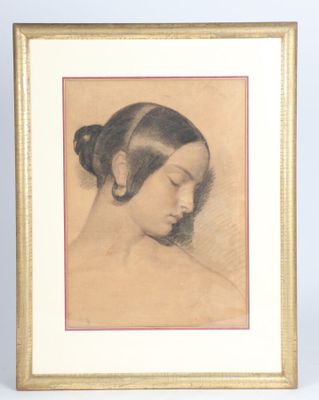 portrait of a woman with her eyes closed in a gold frame