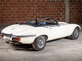 an image of a white sports car parked in a garage