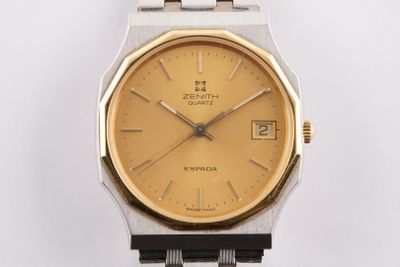 une image représentant une montre au cadran doré