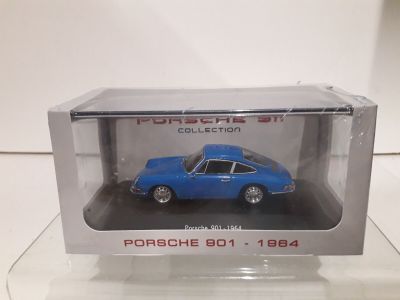 a close up of a toy car in a box on a table