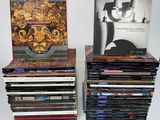 two stacks of cds are stacked on top of each other