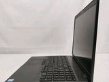 a close up of a laptop computer sitting on top of a white surface