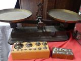 a scale that is sitting on a table with a box