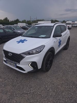 a white car with a blue star on the front
