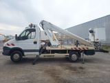 a white truck with a crane on the back of it