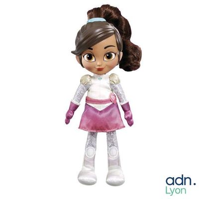 the doll is wearing a pink skirt and a white top