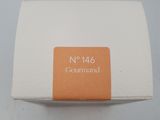 a white box with a brown label on it