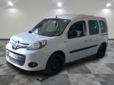 a white van that is parked in a room