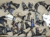 many figurines in a box on the table