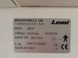 a label on the back of a white refrigerator
