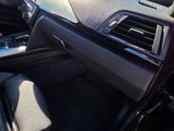 the interior of a car with a dashboard and a steering wheel