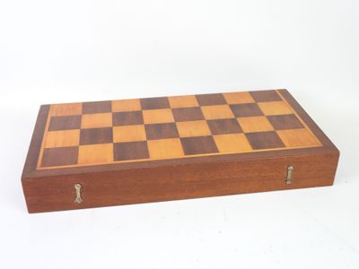 an image of a wooden chess board sitting on top of a white surface