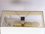 a small model of a small airplane in a box