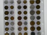 a close up of a bunch of coins in a plastic container