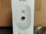 the box is white and has a small camera on top of it