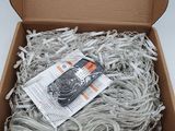 a cardboard box with a bunch of wires inside of it