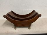 vintage wooden magazine holder with three sections of wood in the shape of a wave