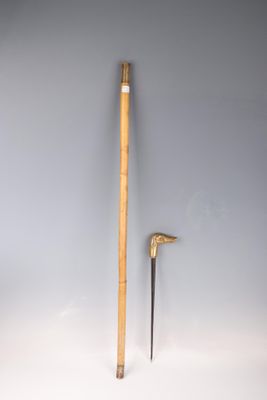 an image of a wooden stick and a wooden stick on a white surface