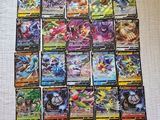 a pile of pokemon cards sitting on top of a table