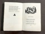 an open book with a picture of a woman sitting on a bed