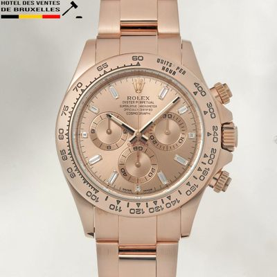 Montre Rolex avec cadran en or rose et lunette sertie de diamants