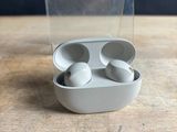 a close up of a pair of earphones in a clear case