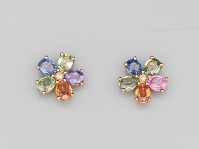 a pair of multicolored sapphire and diamond earrings