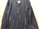 an image of a black jacket hanging on a hanger