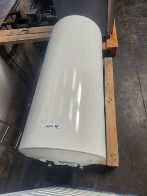 a large white tank sitting on top of a pallet