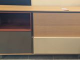 a wooden cabinet with two different colors on it