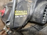 a close up of a motorcycle engine with a yellow sticker on it