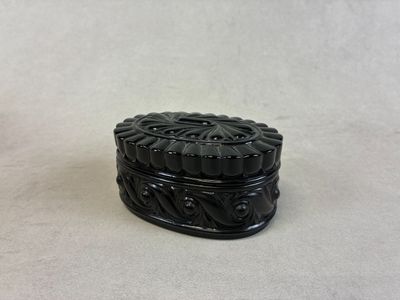 an image of a small black box sitting on top of a table