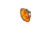 a close up of a ring with an orange stone in it