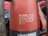 a close up of a red fire hydrant on a table