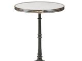 a round table with a metal base and a glass top