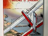 an image of a picture of a book with a plane in the background