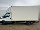 a picture of a white box truck parked in a parking lot