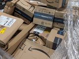 a large pile of boxes sitting on a pallet in a warehouse