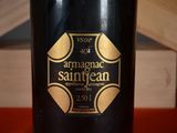 a bottle of wine that is sitting on a table