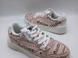 shoes with newspaper print and white laces on them on a white surface