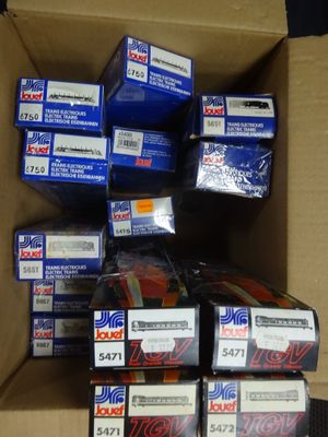 several boxes of assorted items are stacked on top of each other