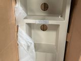 a box that has a toilet in it in it
