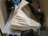 a box full of papers and other items in it