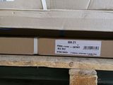 a stack of boxes sitting on a pallet in a warehouse