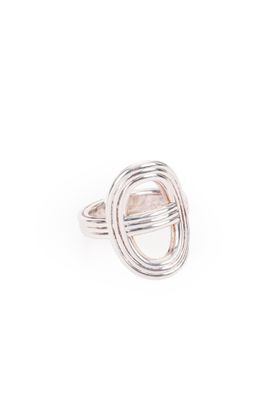 a close up of a silver ring on a white background