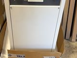 a machine that is sitting on top of a cardboard box
