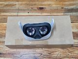 a cardboard box with a pair of glasses in it