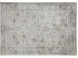 un tapis gris et blanc orné d'un motif floral