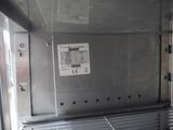 an image of a metal oven with a door open