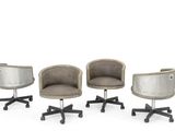 three chairs with wheels and a chair that has a seat on one of them